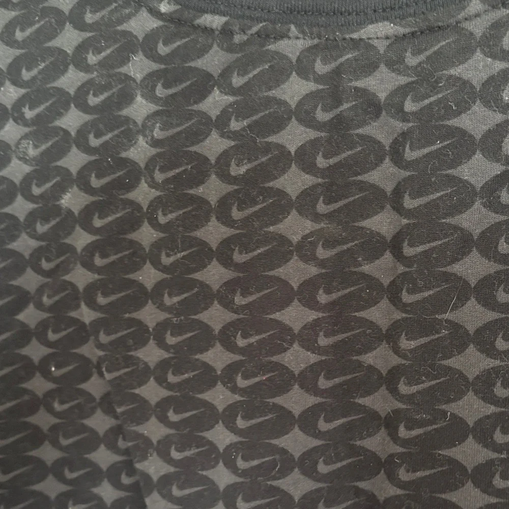 Nike Black Short-Sleeve Tee with Bright Blue Swoosh